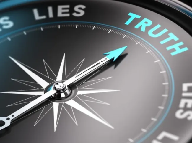 compass showing lies and truth